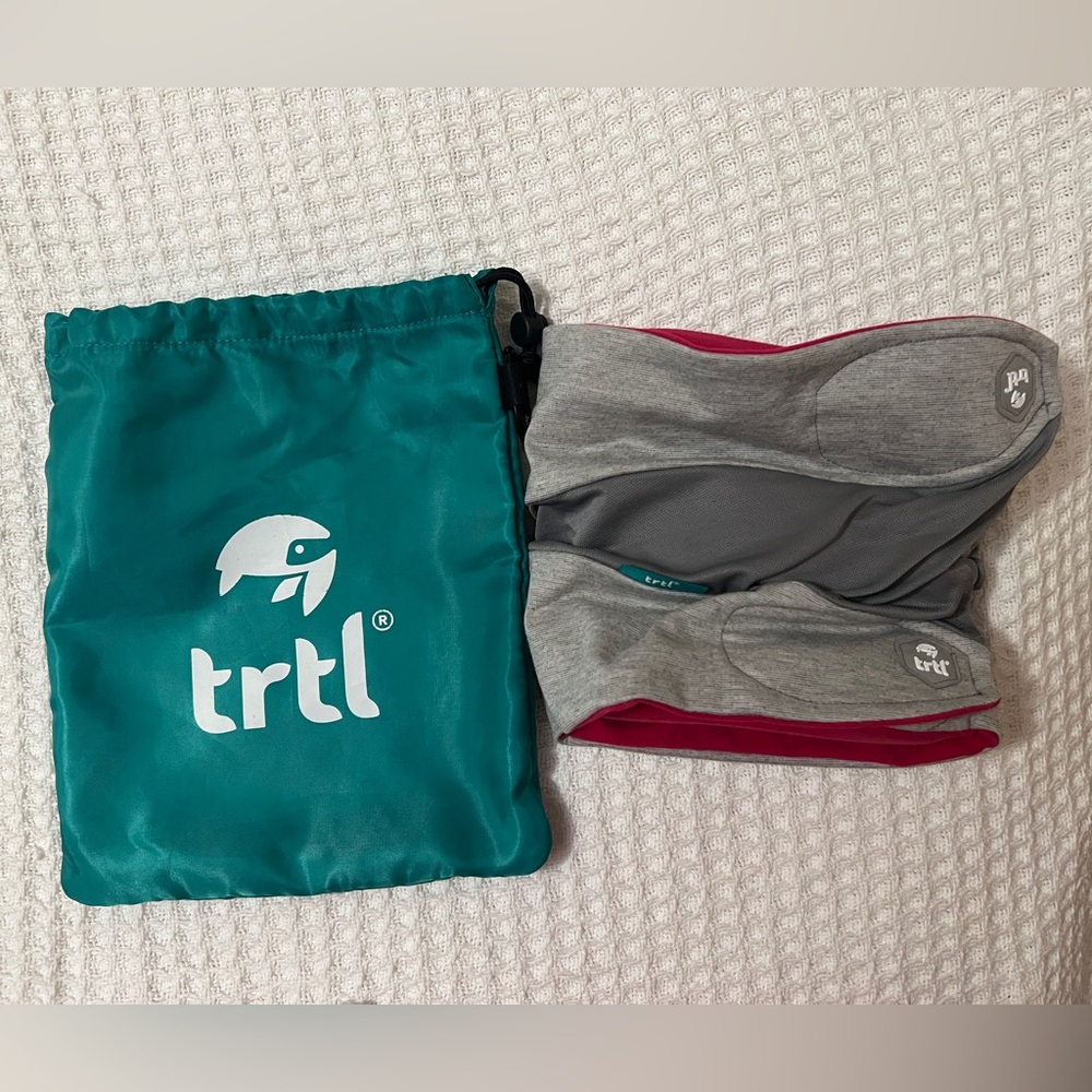 Trtl travel pillow plus. Pink and grey with green bag. EUC